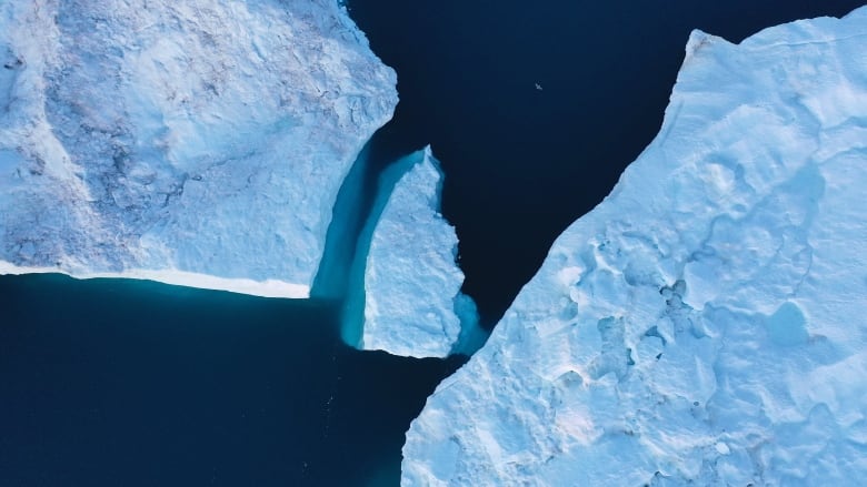 In this aerial view icebergs float in the Ilulissat Icefjord on August 04, 2019 near Ilulissat, Greenland.