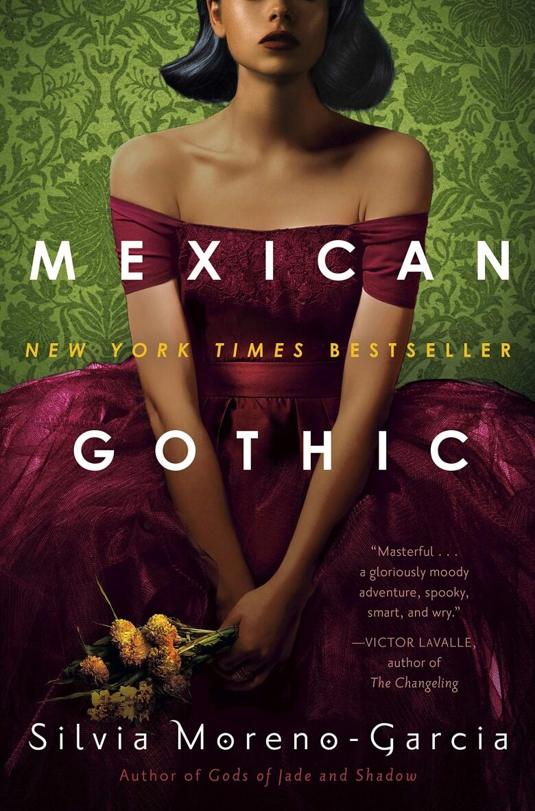 Book cover, green background with woman with brown skin sitting in a red dress. 