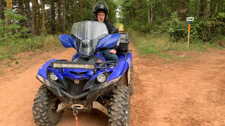 Peter Mellish on an ATV.