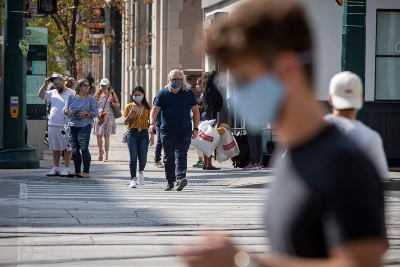 People wearing masks during the second wave of the COVID-19 pandemic.