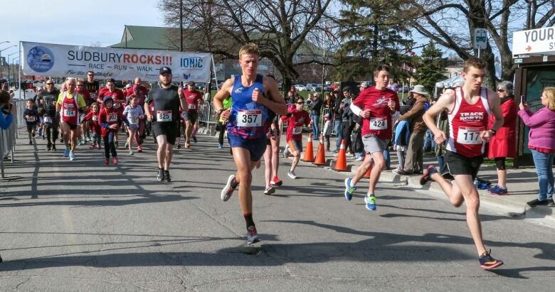 A group of runners running a marathon.