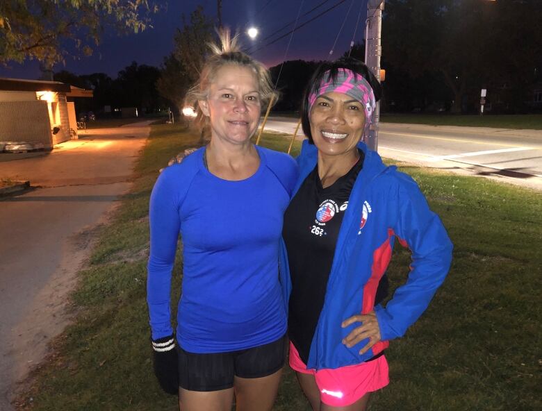 Two women in running attire