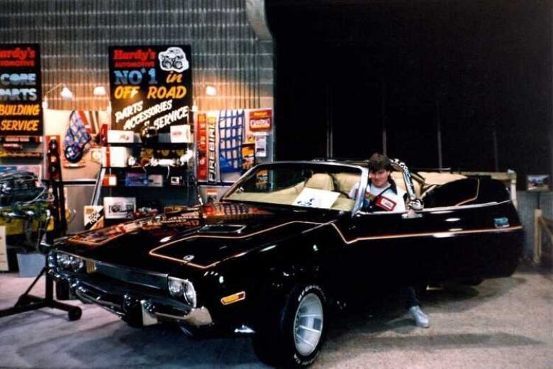 A dodge convertible in the late 1980s.