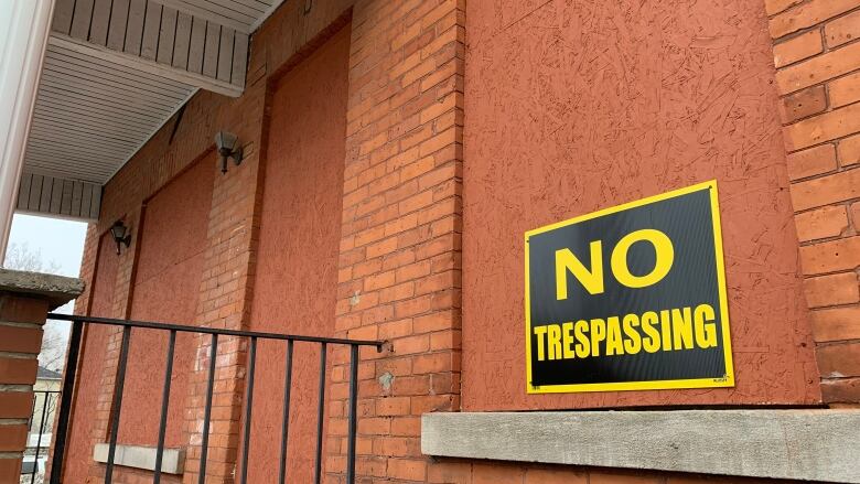 A house with a no trespassing sign