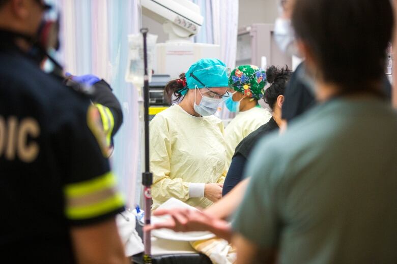 A health care worker in an emergency department is pictured.