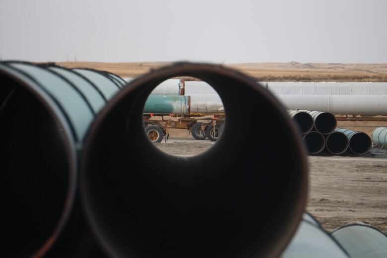 A look through a section of steel pipeline.