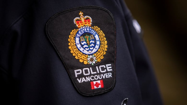 A close-up picture of a Vancouver Police Department shoulder badge.