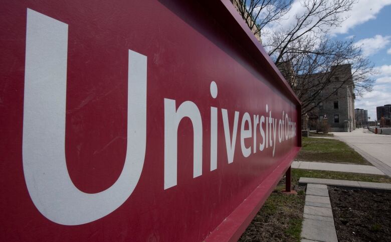 Extreme close-up of a sign reading University of Ottawa