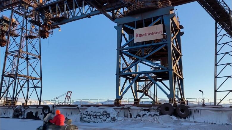 Scaffolds and stairs with a sign that says Baffinland.