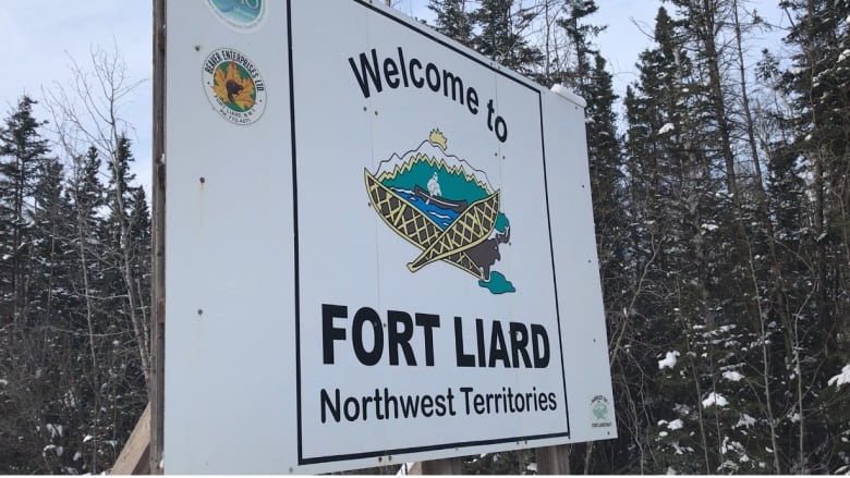 A large sign reads, 'Welcome to Fort Liard, Northwest Territories.'