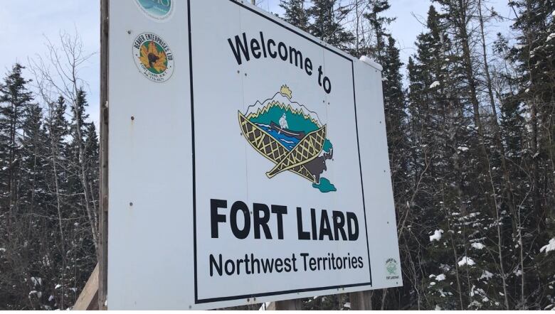 A large sign reads, 'Welcome to Fort Liard, Northwest Territories.'