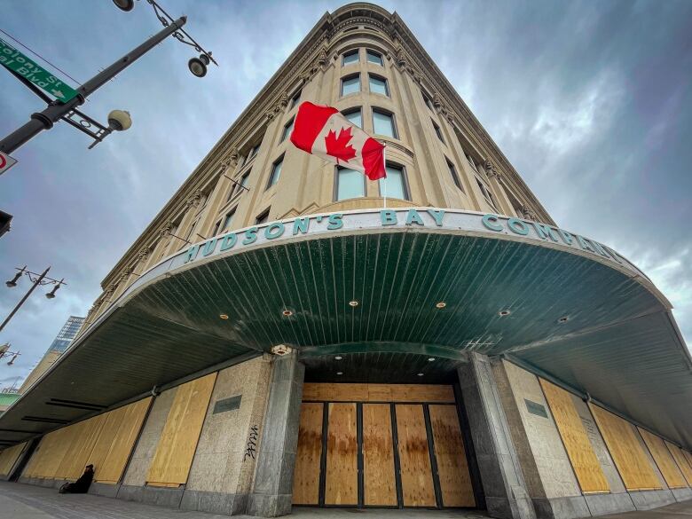 A building with boarded up windows and doors