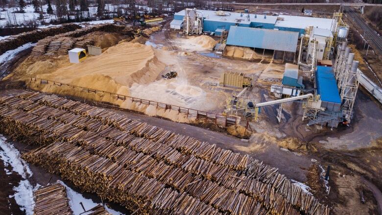 An aerial shot of logs amassed at a wood pellet mill in Smithers, B.C. 