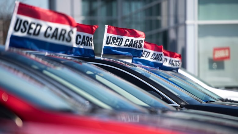 Used vehicles for sale are seen at an auto mall in Ottawa April 26, 2021.