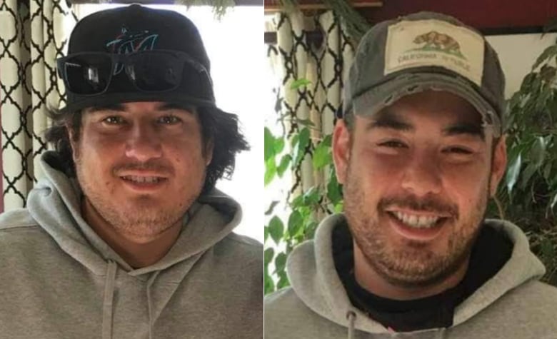 Two men in baseball caps and hoodies with stubble on their faces smile for the camera.