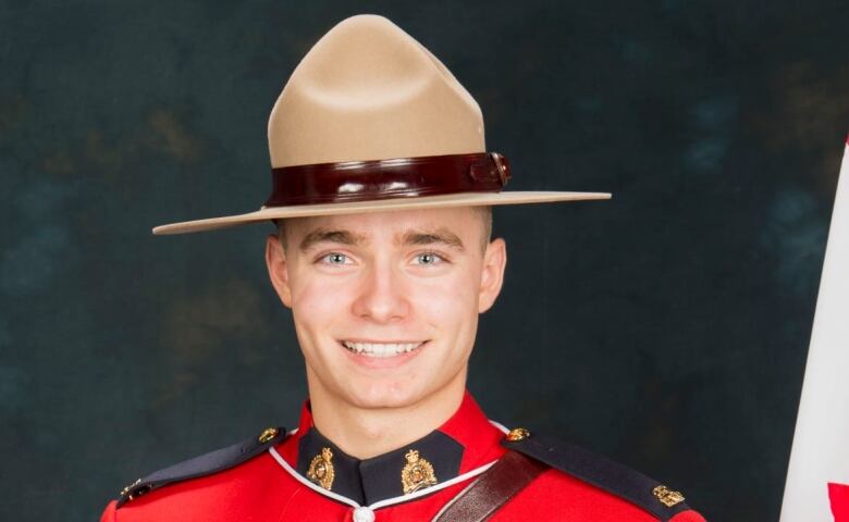 Const. Shelby Patton is show wearing the red serge uniform of the Royal Canadian Mounted Police. 