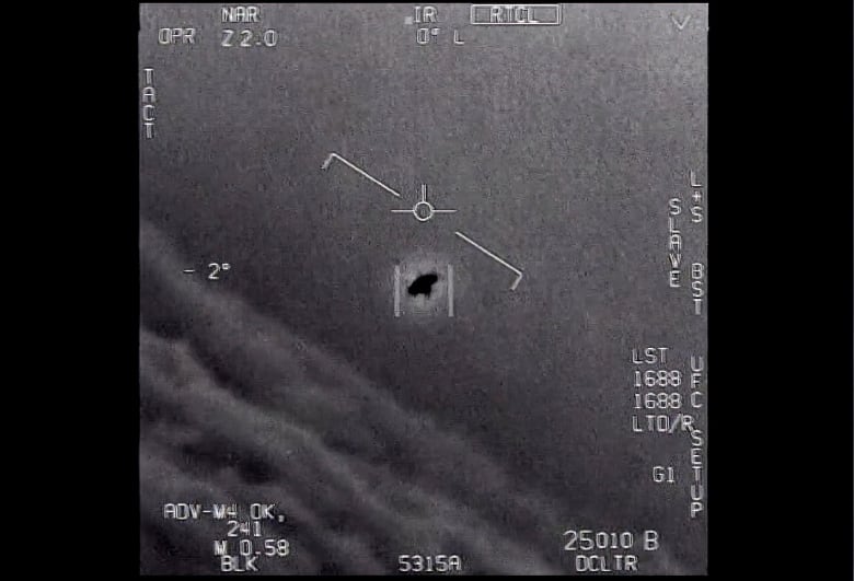 A grainy image of an unidentified aerial phenomenon is seen.