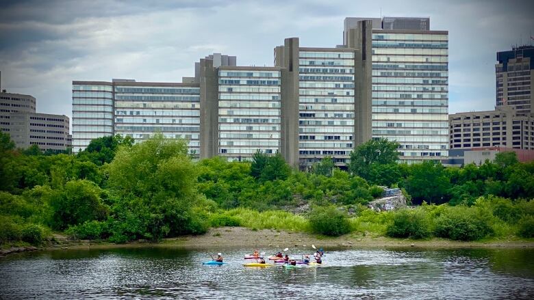 Picture of the Place du Portage III buildings from the Ottawa river. 