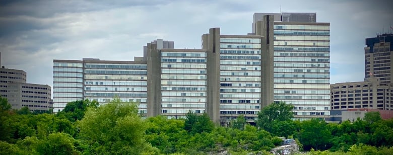 Picture of the Place du Portage III buildings from the Ottawa river. 