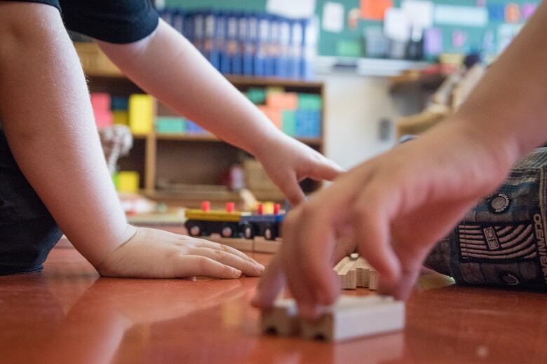 Kids play with toys in a pre-primary classroom