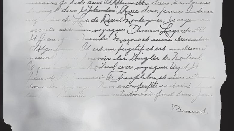 A picture of a letter written in cursive.