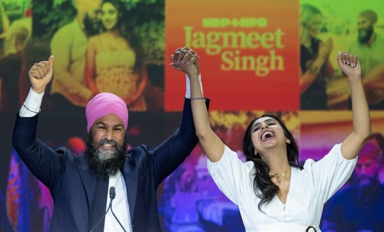 NDP Leader Jagmeet Singh and his wife Gurkiran Kaur Sidhu arrive on stage to deliver his concession speech at his election night headquarters during the Canadian federal election in Vancouver, Monday, September 20, 2021.