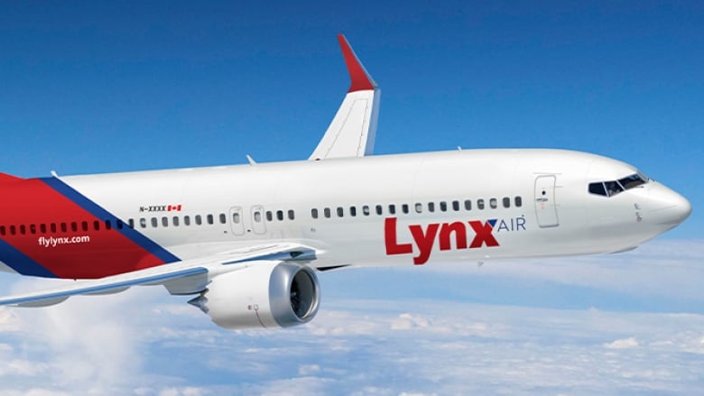 A photo of a a red and white airplane in the air with the name Lynx written in red letters.