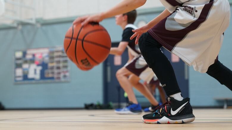 People playing basketball.