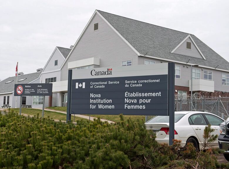 A building with a Correctional Service of Canada sign reading 'Nova Institution for Women.'