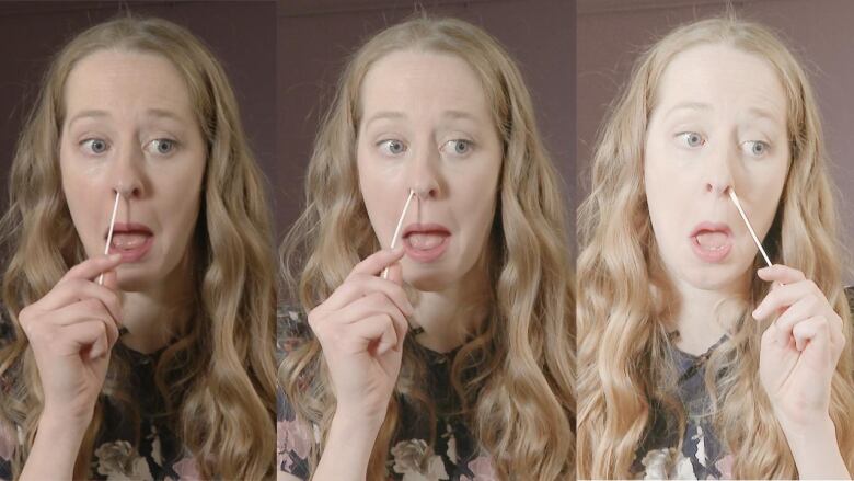 A woman with long, wavy blond hair, sticking a swab stick up her nostril to test for COVID-19.