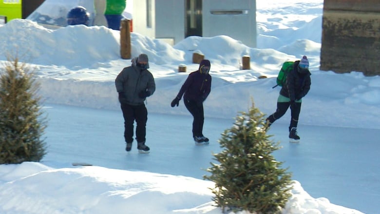 Skaters try out the trail on Nestaweya River Trail in Winnipeg.