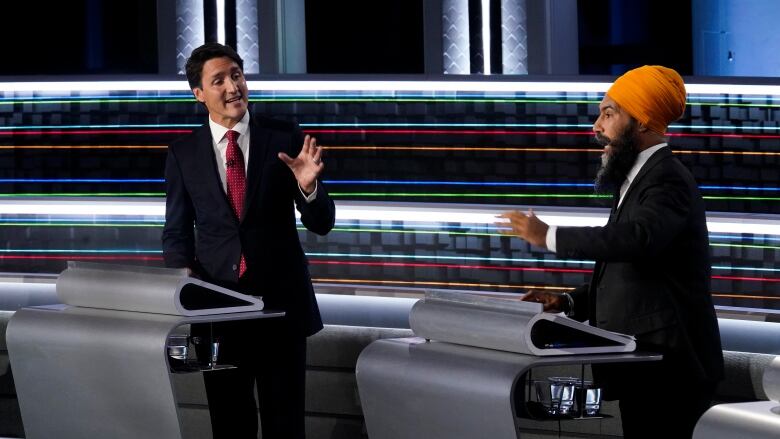 Liberal Leader Justin Trudeau, left, and NDP Leader Jagmeet Singh, take part in the federal election English-language Leaders debate in Gatineau, Que., on Thursday, Sept. 9, 2021.