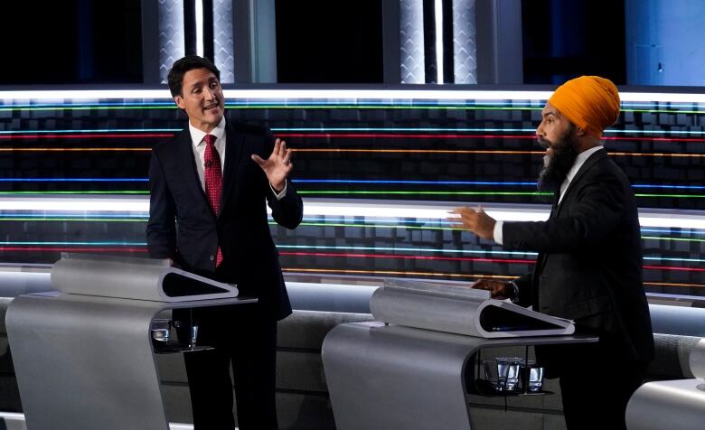 Liberal Leader Justin Trudeau, left, and NDP Leader Jagmeet Singh, take part in the federal election English-language Leaders debate in Gatineau, Que., on Thursday, Sept. 9, 2021.