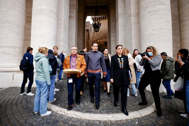 From left to right: Assembly of First Nations Northwest Territories Regional Chief Gerald Antoine, Inuit Tapiriit Kanatami President Natan Obed,and Mtis National Council President Cassidy Caron walk in St. Peter's Square after an April 2022 audience with Pope Francis.