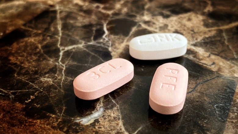 Three big Paxlovid pills