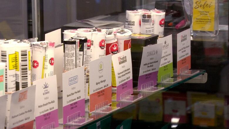 A shelf of various cannabis products.