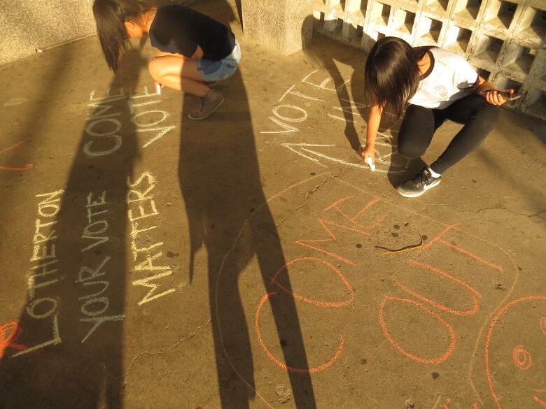 Children in North York encourage adults to head to the polls before the 2018 provincial eelction. 