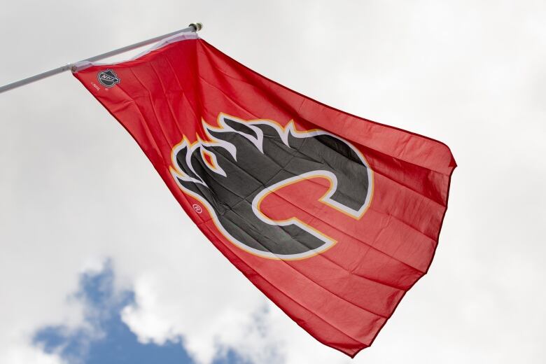 A flag with the Calgary Flames logo