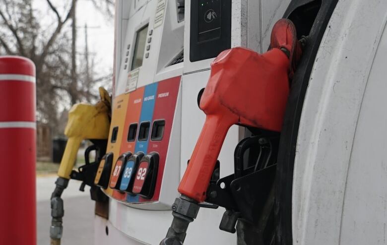 Self-serve pumps at a gas station.