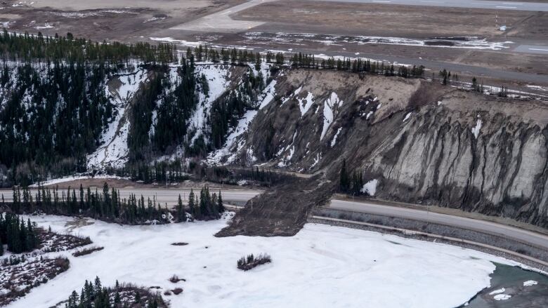 An aerial view of a landslide area along an escarpment.