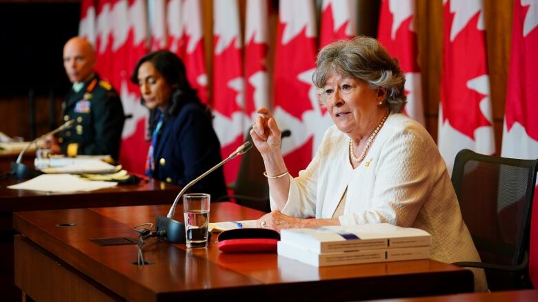 Former Supreme Court Justice Louise Arbour, and Minister of National Defence,  Anita Anand, middle, release the final report of the Independent External Comprehensive Review into Sexual Misconduct and Sexual Harassment in the Department of National Defence and the Canadian Armed Forces in Ottawa on Monday, May 30, 2022. Also in attendance is Chief of the Defence Staff, Gen. Wayne Eyre.