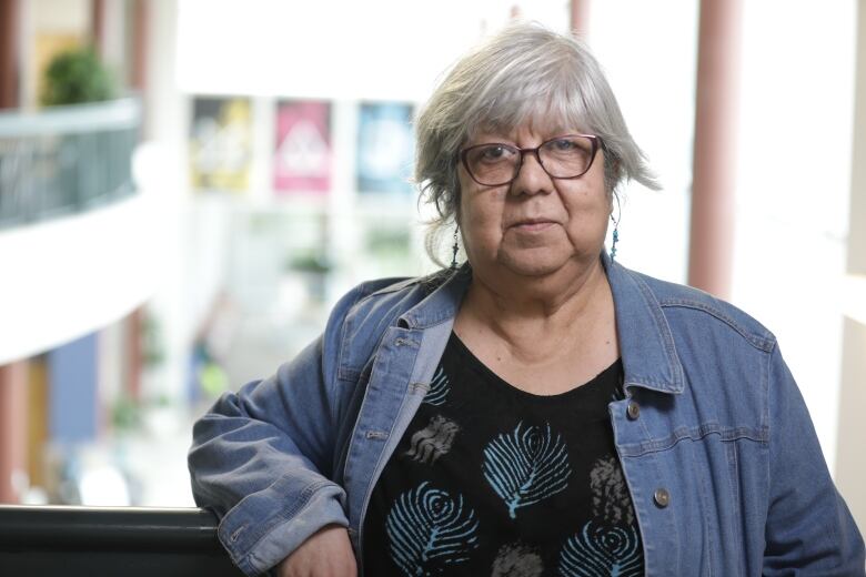 Mirtha Rivera, the seniors co-ordinator with the UR Pride Centre, stands outside of the centre's office at the University of Regina.