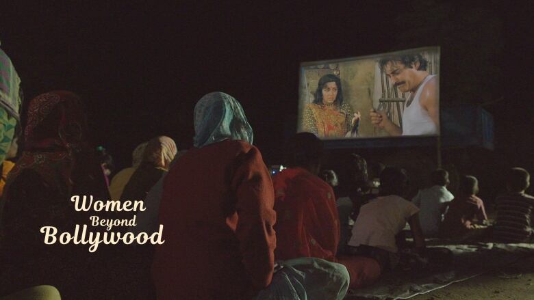 People watching a Bollywood film