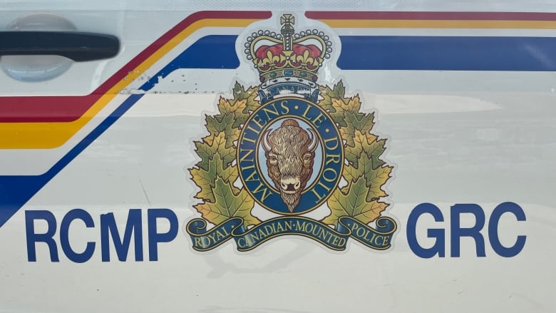 Close up of the RCMP logo on an RCMP car.