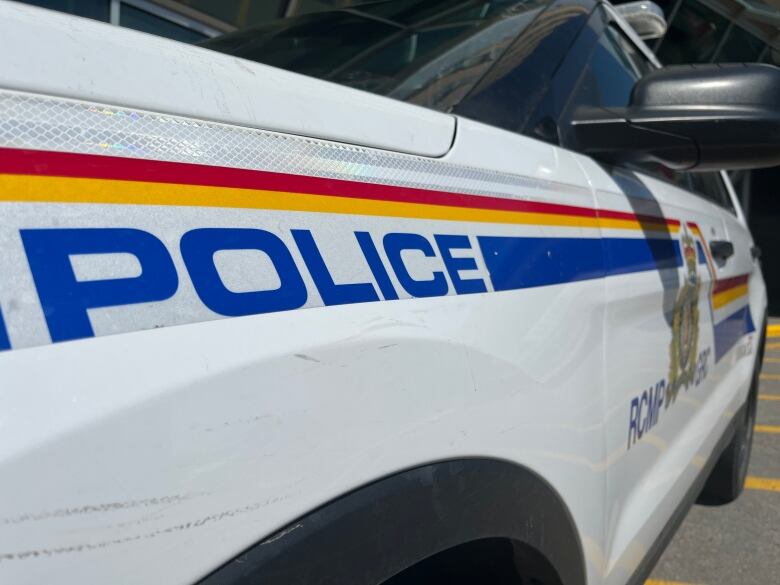 The side of an RCMP cruiser that says 'police.'