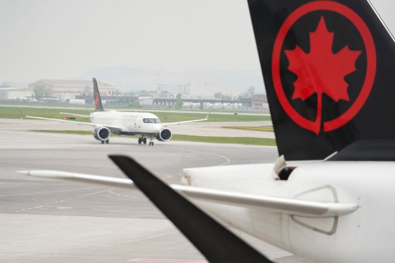 An Air Canada flight taxis on the tarmac at Pierre Elliott Trudeau International Airport in Montreal, Quebec.