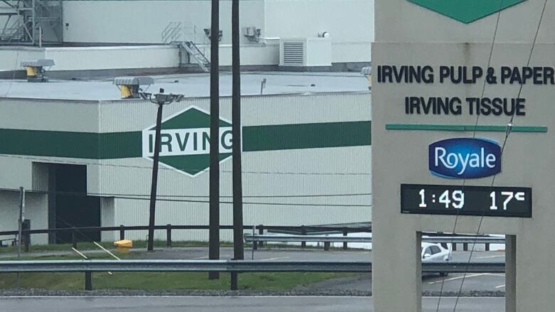 pulp mill with a sign that reads: Irving Pulp and Paper 