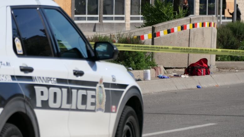 A police car and police tape.