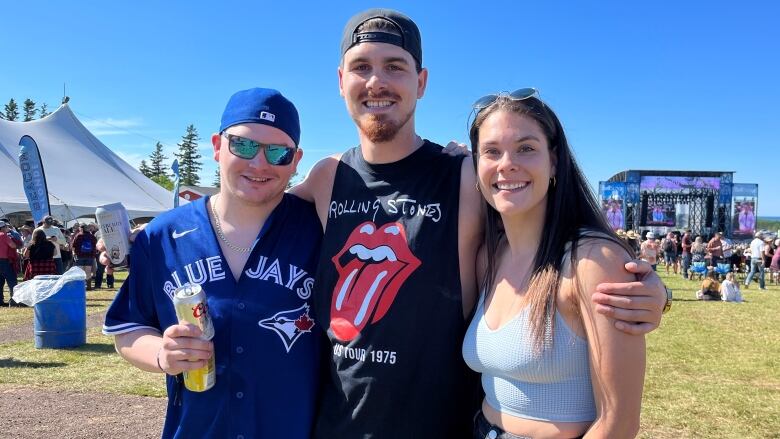 Jordan Capstick, Bradley States and Brittany States, left to right, are meeting up with friends and family at the Cavendish Beach Music Festival.