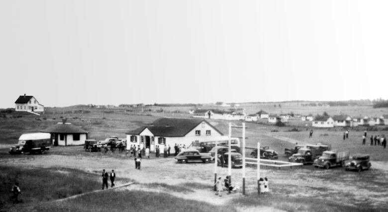 Black and white photo of a rural community.